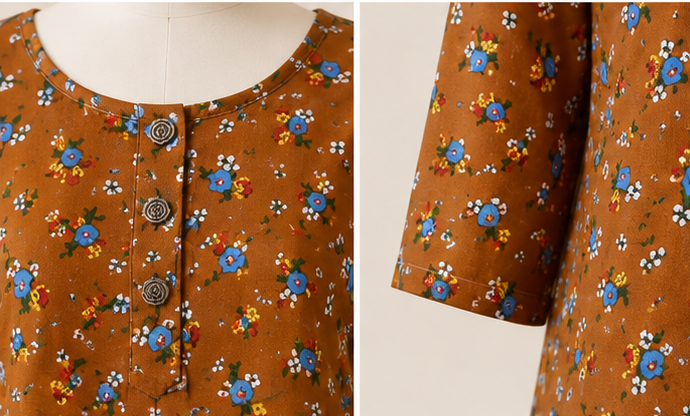 Brown Floral Tunic Neckline and Button Detail Close Up Brown Floral Tunic Neckline and Button Detail Close Up